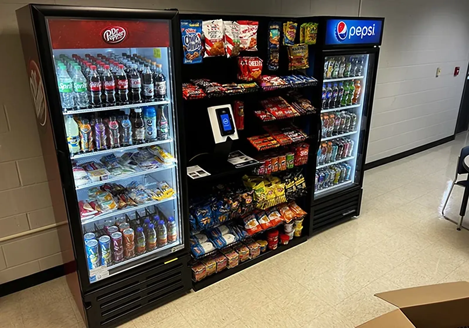 Micro market with coolers and snack shelves installed in an Atlanta workplace