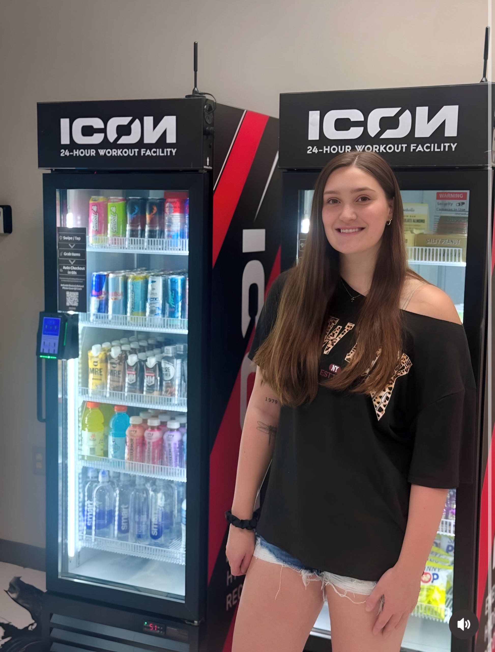VendGO employee servicing modern vending machines in an Atlanta business